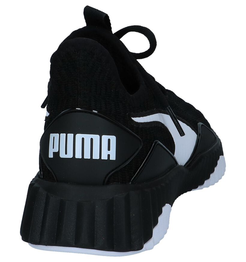 Zwarte Runner Sneakers Puma Defy in stof (239411)