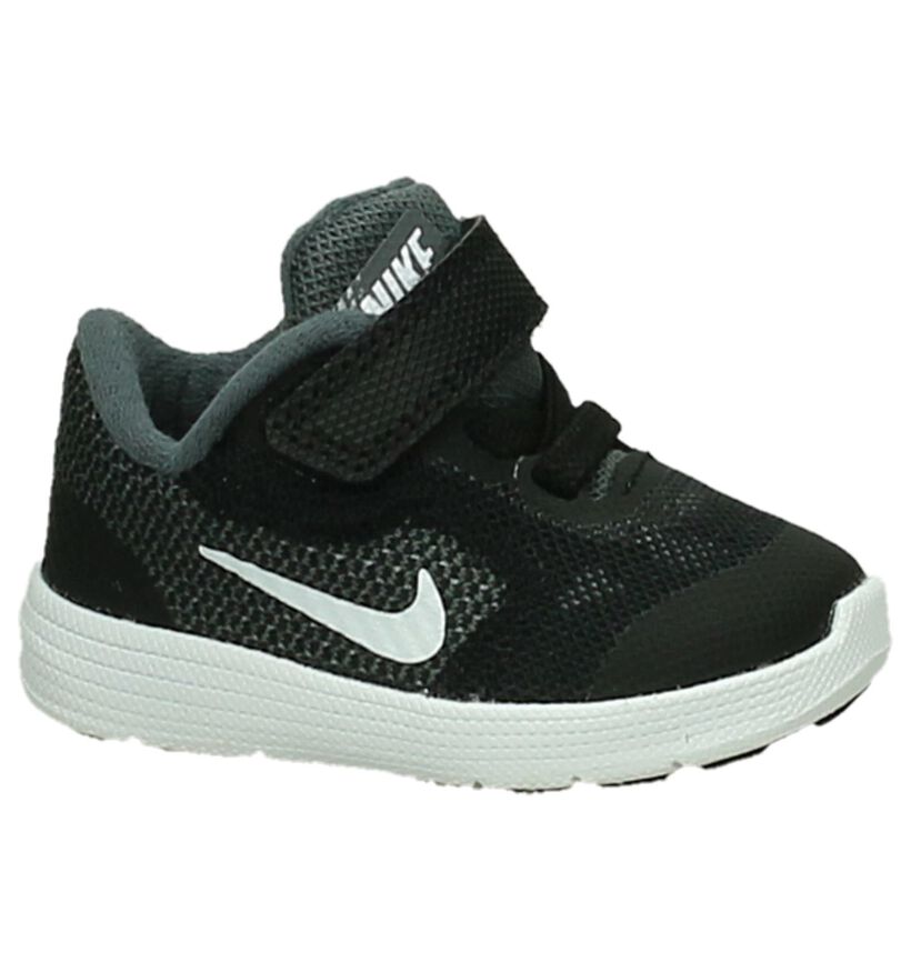 Nike Revolution Baskets basses en Noir en textile (211628)